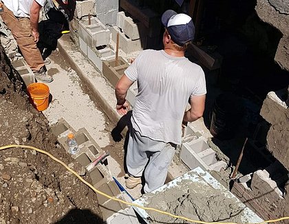 starting first layer of blocks pinned with rebar