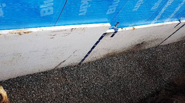 new rock and insulation on north wall